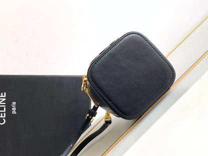 MINI TROUSSE DE VANITY TRIOMPHE EN CUIR DE VEAU NOIR