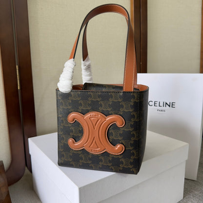 SAC CUBE 15 EN TOILE TRIOMPHE NOIRE ET CUIR DE VEAU MARRON