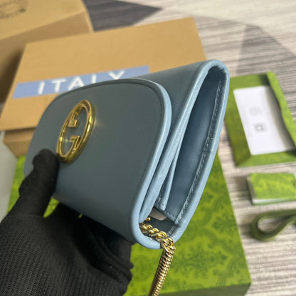 SAC BANDOULIÈRE BLONDIE 21 EN CUIR DE VEAU BLEU CIEL, QUINCAILLERIE DORÉ