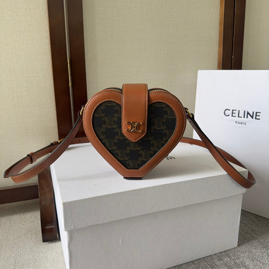 SAC HEART TAMBOUR 15 EN TOILE TRIOMPHE NOIRE ET CUIR DE VEAU MARRON BRONZE