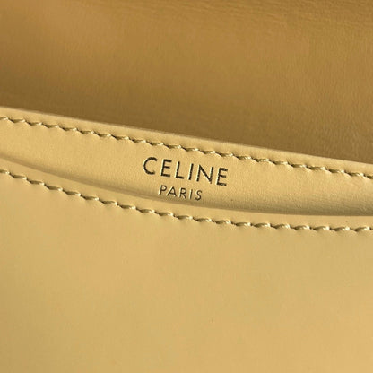 SAC À MAIN TRIOMPHE EN CUIR DE VEAU BRILLANT 18 JAUNE PASTEL