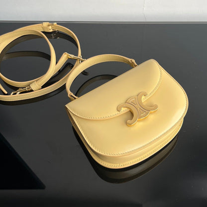 SAC À MAIN TRIOMPHE EN CUIR DE VEAU BRILLANT 18 JAUNE PASTEL