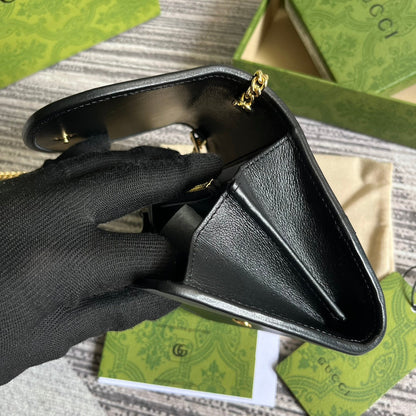 Mini sac bandoulière Blondie Interlock 12 en cuir de veau noir avec chaîne dorée