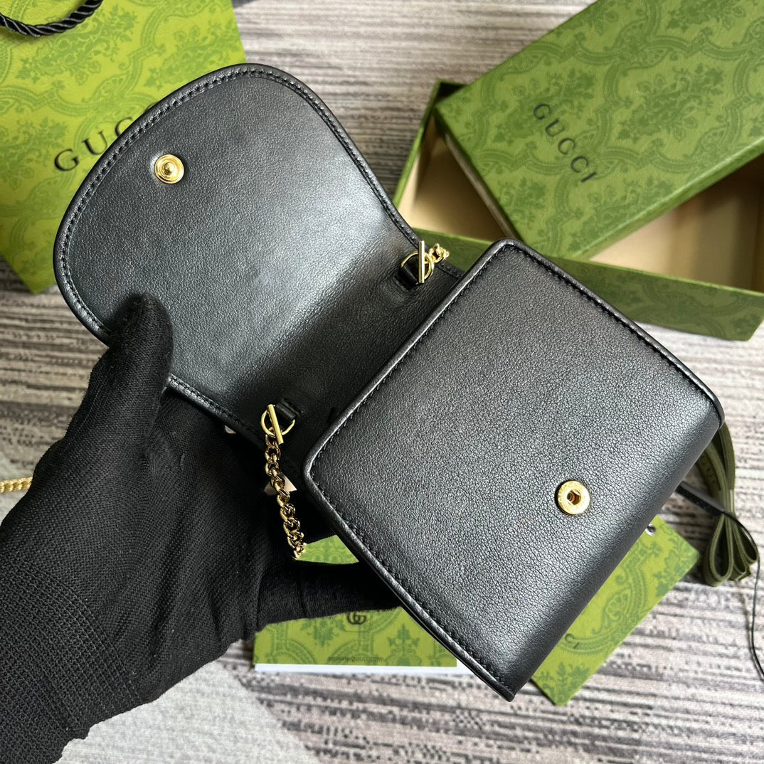 Mini sac bandoulière Blondie Interlock 12 en cuir de veau noir avec chaîne dorée