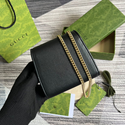Mini sac bandoulière Blondie Interlock 12 en cuir de veau noir avec chaîne dorée