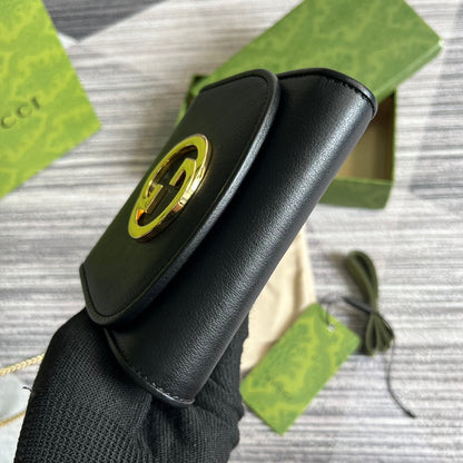 Mini sac bandoulière Blondie Interlock 12 en cuir de veau noir avec chaîne dorée