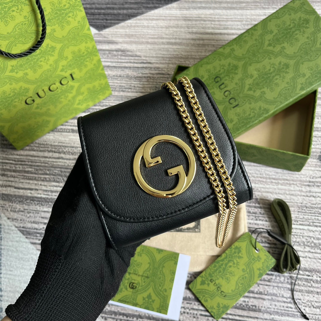 Mini sac bandoulière Blondie Interlock 12 en cuir de veau noir avec chaîne dorée