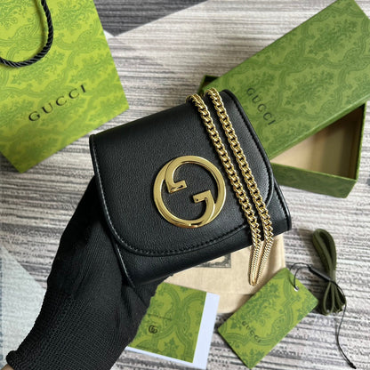 Mini sac bandoulière Blondie Interlock 12 en cuir de veau noir avec chaîne dorée