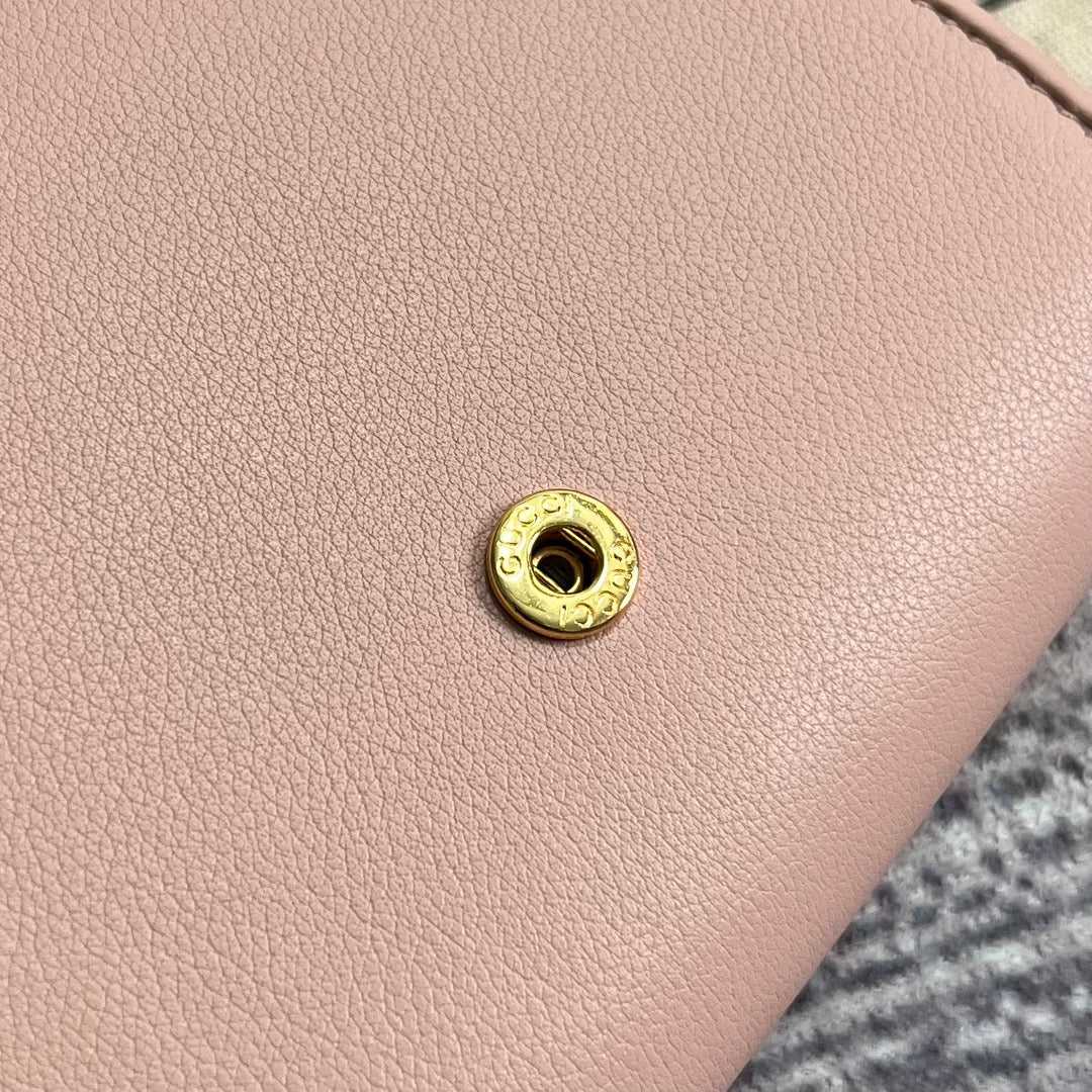 Mini sac bandoulière Blondie Interlock 12 en cuir de veau rose clair avec chaîne dorée
