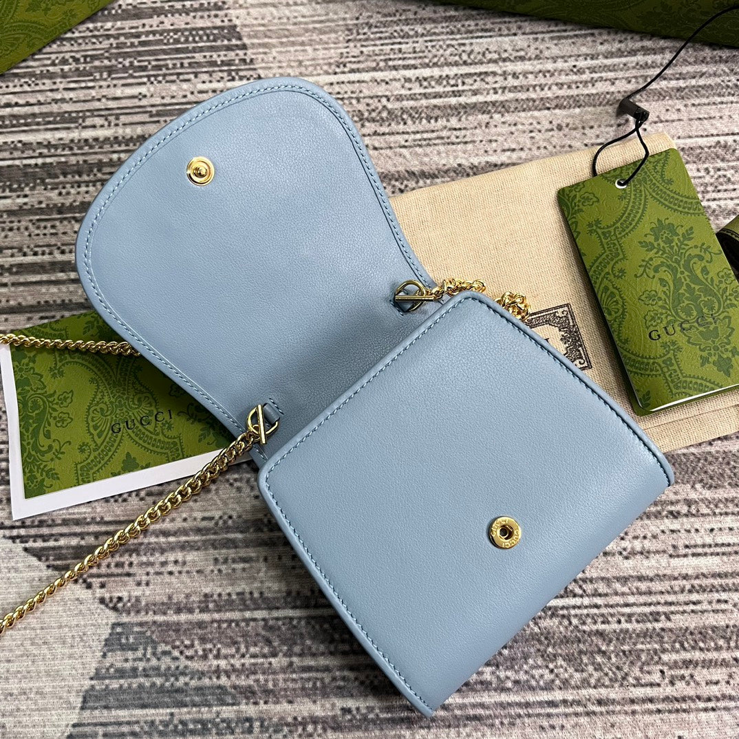 Mini sac bandoulière Blondie Interlock 12 en cuir de veau bleu ciel avec chaîne dorée