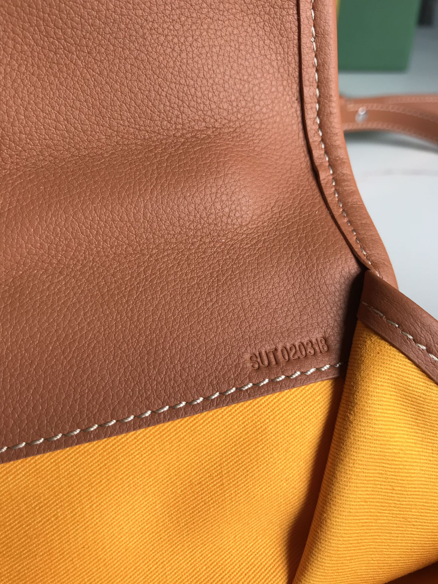 SAC À DOS SAINT LÉGER 35 EN TOILE GOYARDINE MARRON ET CUIR DE VEAU AVEC PATCH CARTOON