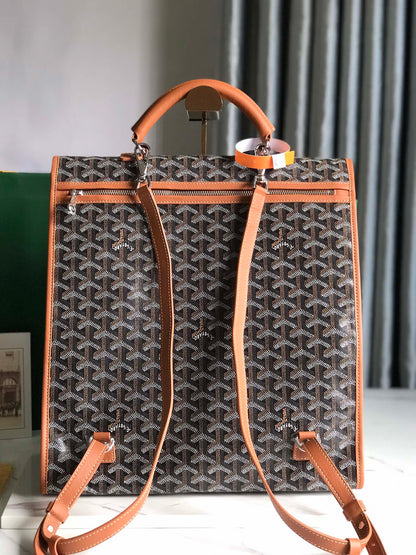SAC À DOS SAINT LÉGER 35 EN TOILE GOYARDINE MARRON ET CUIR DE VEAU AVEC PATCH CARTOON