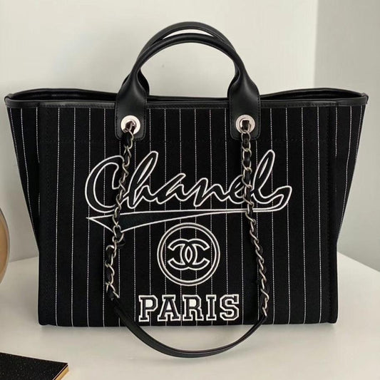 Grand sac fourre-tout CC 50 en toile noire avec bandoulière