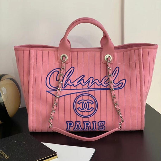 Grand sac fourre-tout CC 50 en toile rose clair avec bandoulière