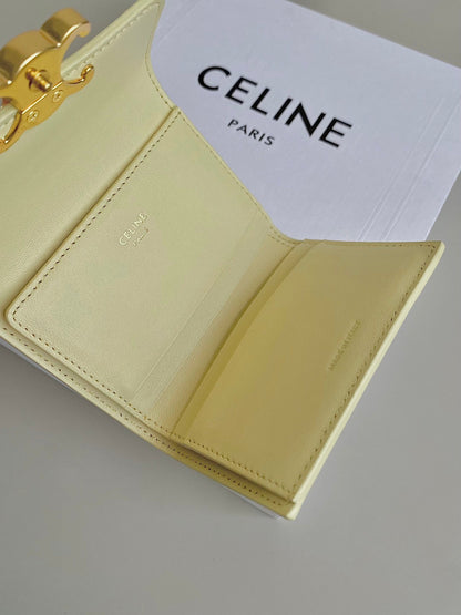 PORTEFEUILLE TRIPHOME 9 DEUX EN UN EN CUIR DE VEAU JAUNE PASTEL