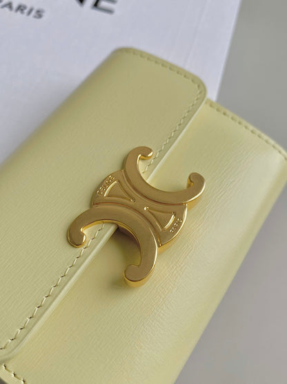 PORTEFEUILLE TRIPHOME 9 DEUX EN UN EN CUIR DE VEAU JAUNE PASTEL
