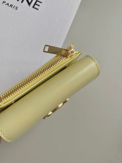 PORTEFEUILLE TRIPHOME 9 DEUX EN UN EN CUIR DE VEAU JAUNE PASTEL