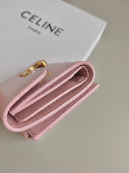 PORTEFEUILLE TRIPHOME 9 DEUX EN UN EN CUIR DE VEAU ROSE PASTEL