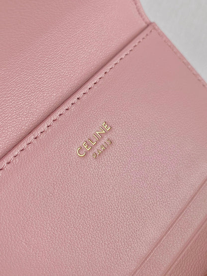 PORTEFEUILLE TRIPHOME 9 DEUX EN UN EN CUIR DE VEAU ROSE PASTEL
