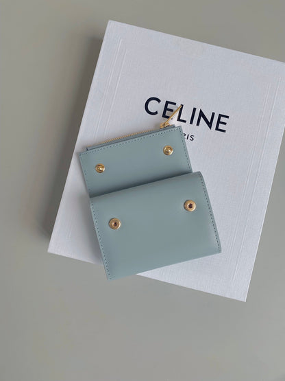 PORTEFEUILLE TRIPHOME 9 DEUX EN UN EN CUIR DE VEAU BLEU GLACIER