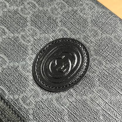Pochette GG CLASP 20 en toile noire et cuir de veau