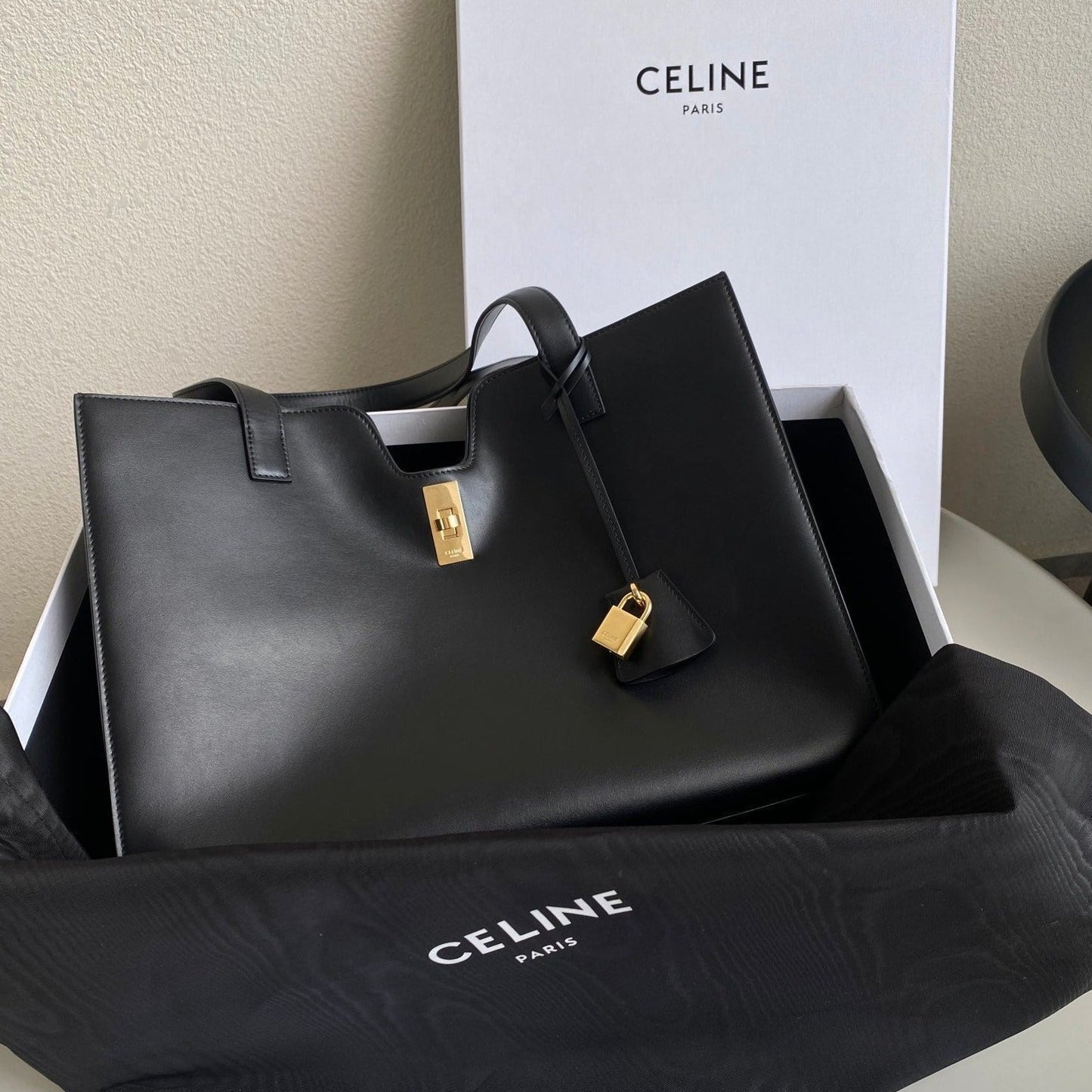 CABAS TRIOMPHE 37 NOIR EN CUIR DE VEAU LISSE