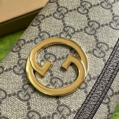 Sac bandoulière Blondie 21 en toile monogrammée beige et garniture en cuir de veau marron foncé, matériel doré