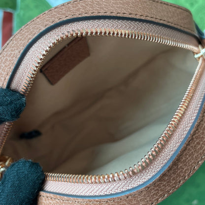 Mini sac bandoulière rond OPHIDIA 18 pouces en toile rose poudré et bordure en cuir marron