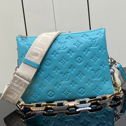 coussin pm 26cm cuir de veau empreinte monogram bleu tiffany 