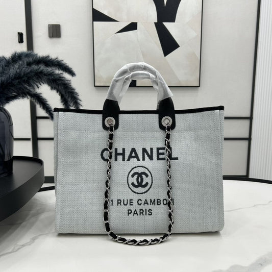 Sac CC Deauville en tweed, cuir noir, accessoires dorés, 17
