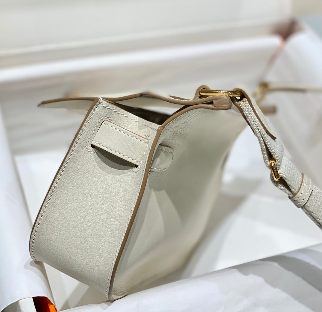 SAC BANDOULIÈRE KELLY 23 CM JYPSIERE EN CUIR BLANC GHW
