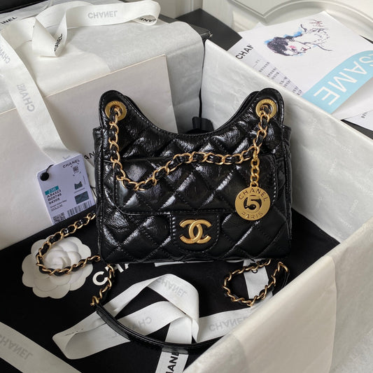 sac hobo cc 17 en cuir noir huilé et ciré