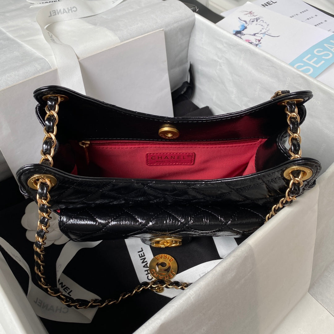 sac hobo cc 21,5 en cuir noir huilé et ciré