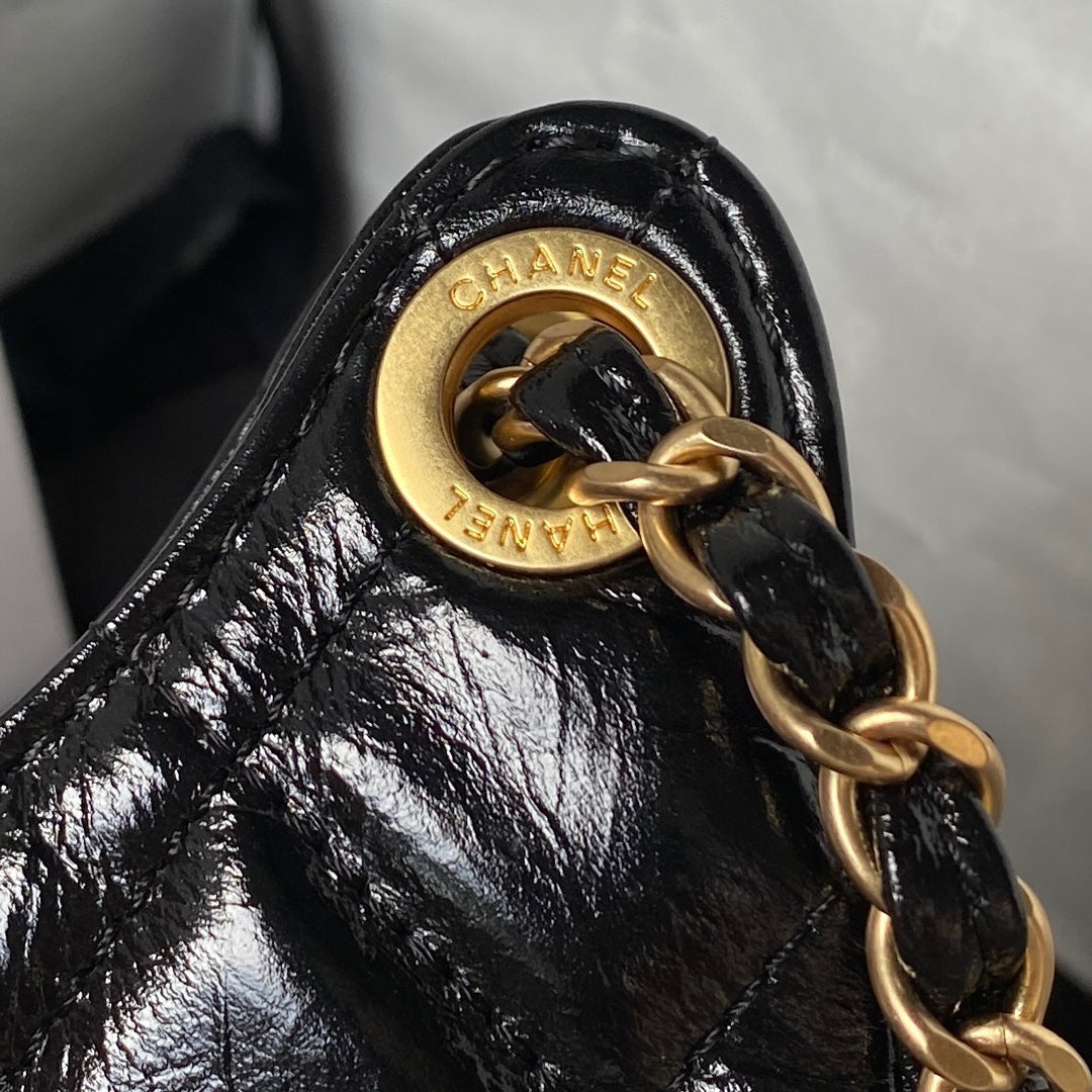 sac hobo cc 21,5 en cuir noir huilé et ciré