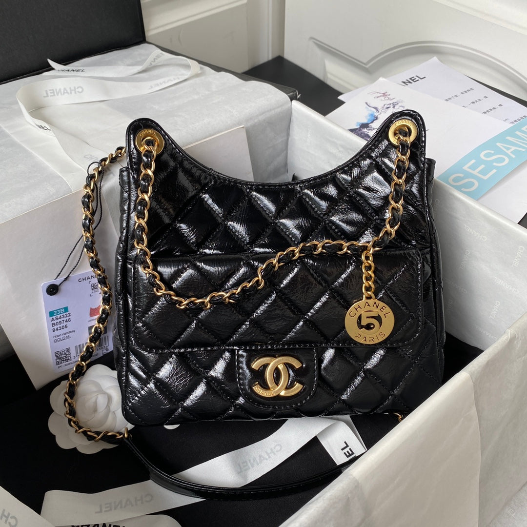 sac hobo cc 21,5 en cuir noir huilé et ciré