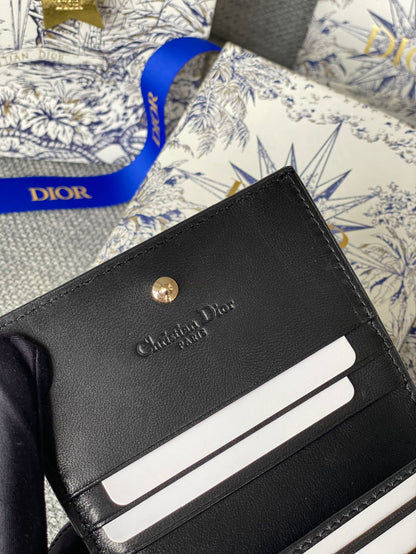Portefeuille compact CD Caro 11 cm en cuir de veau noir brillant