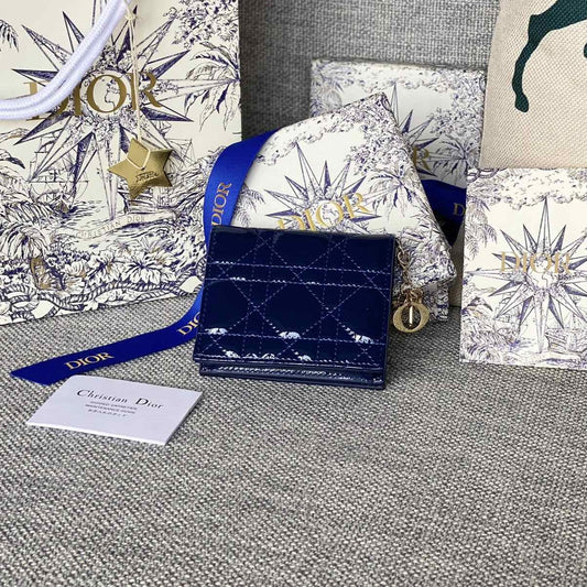 Portefeuille compact CD Caro 11 cm en cuir de veau bleu brillant 