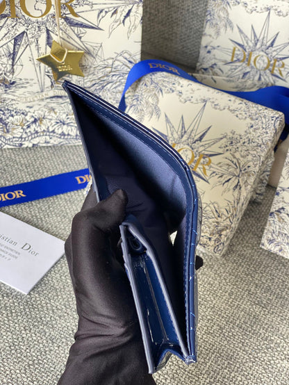 Portefeuille compact CD Caro 11 cm en cuir de veau bleu brillant 