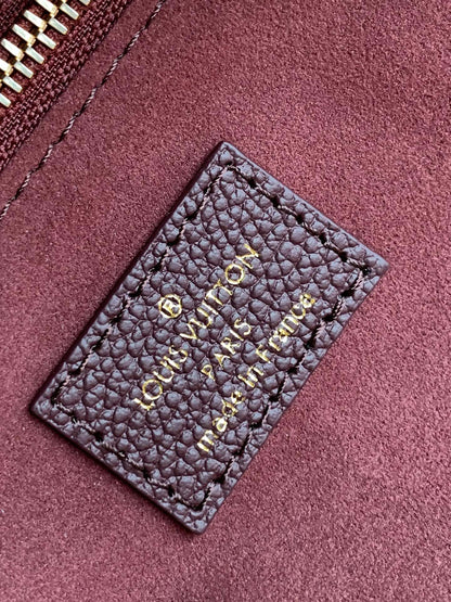 NEVERFULL MM 32 CUIR EMPREINTE MONOGRAMME VIN 
