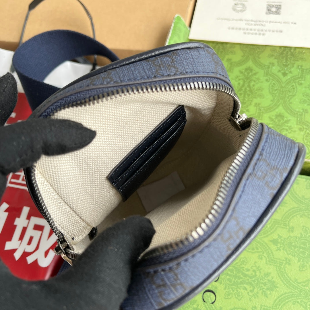 Mini sac OPHIDIA 18 en toile monogrammée bleu foncé et bordure en cuir d'agneau noir