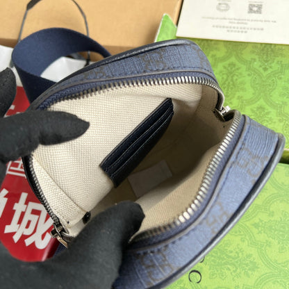 Mini sac OPHIDIA 18 en toile monogrammée bleu foncé et bordure en cuir d'agneau noir