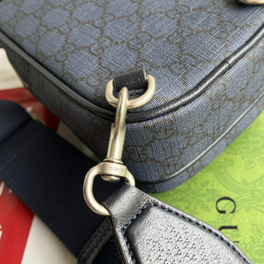 Mini sac OPHIDIA 18 en toile monogrammée bleu foncé et bordure en cuir d'agneau noir