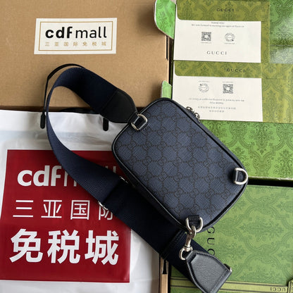 Mini sac OPHIDIA 18 en toile monogrammée bleu foncé et bordure en cuir d'agneau noir