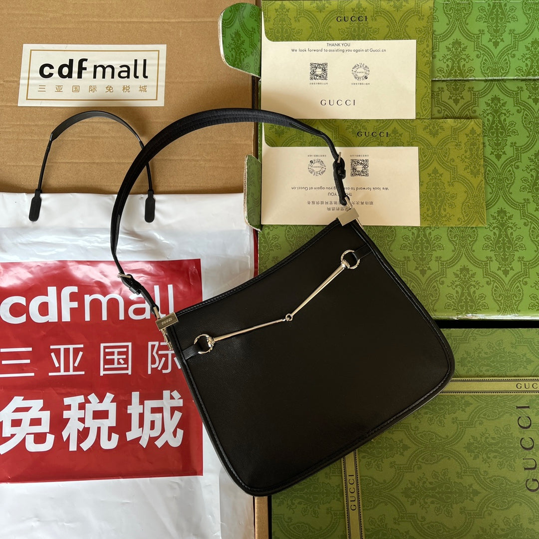 Petit sac bandoulière fin en mors de cheval 23 en cuir de veau noir, matériel palladié