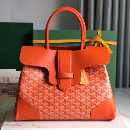 SAC SAIGON SOUPLE 34 EN TOILE GOYARDINE ROUGE ORANGE ET CUIR DE VEAU
