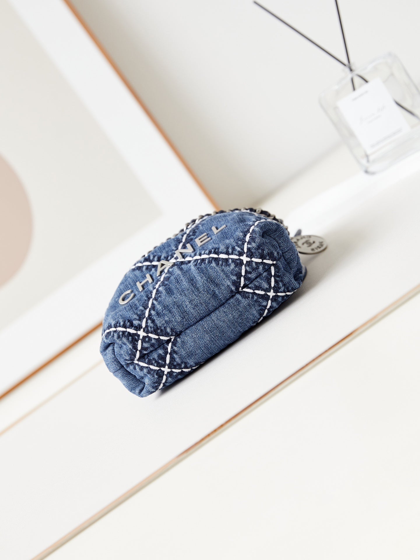 Mini sac à dos CC 22 en denim bleu cousu et matériel argenté