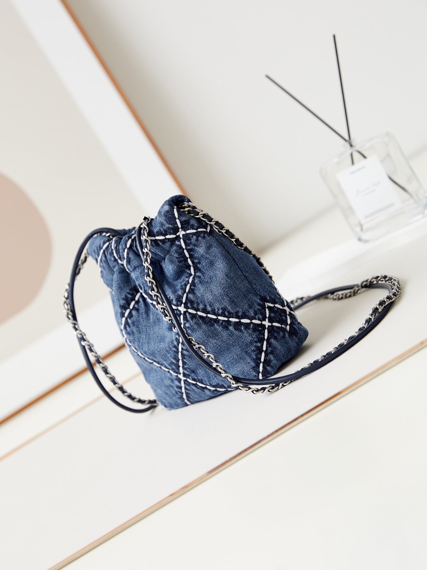 Mini sac à dos CC 22 en denim bleu cousu et matériel argenté