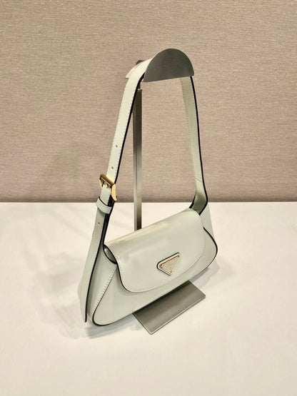 SAC À RABAT 25 EN CUIR DE VEAU LISSE BLANC LOGO TRIANGLE