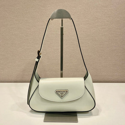SAC À RABAT 25 EN CUIR DE VEAU LISSE BLANC LOGO TRIANGLE