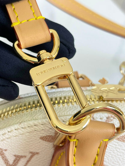 ALMA BB 25 EN TOILE DUNE MONOGRAMME BLANC QUINCAILLERIE DORÉ